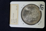 1885O Morgan dollar in Hannes Tulving Slab