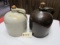 2 crock whisky jugs (1 brown, 1 white)