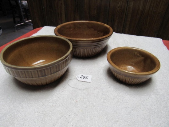 3 brown crock bowls