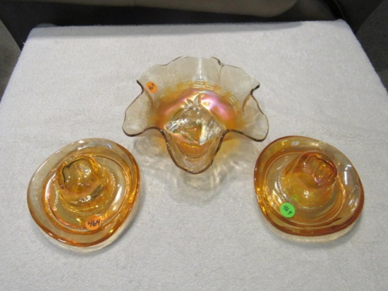 3 marigold carnival glass pieces (2 hat ashtrays, 1 embossed horse bowl) (bowl manufacture flaw)