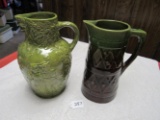 2 green crock pitchers