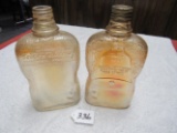 2 carnival glass whiskey bottles