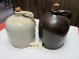 2 crock whisky jugs (1 brown, 1 white)