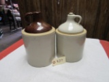 2 crock whiskey jugs (1 white, 1 -two tone)