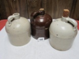 3 whiskey crock jugs (2 white 1 brown)(1 with crazing)