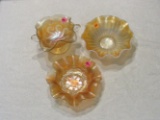 3 marigold carnival glass dishes (various patterns)