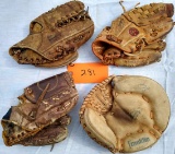 4 Old Baseball Gloves