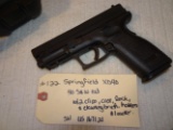 Springfield XD40 .40 S&W cal w/2clips, case, lock, cleaning brush, holsters & loader.