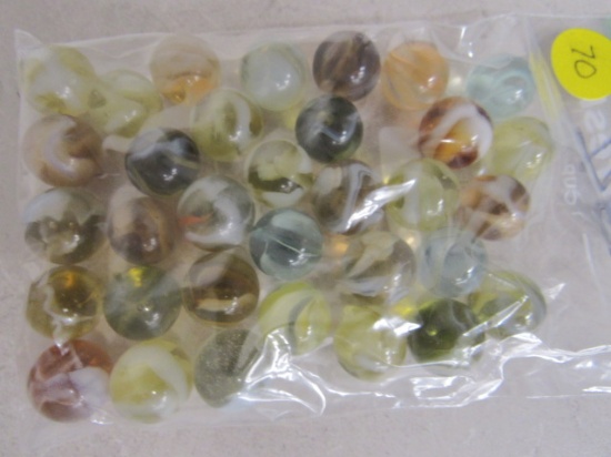 34 various colored marbles