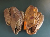 1 Reggie Jackson baseball glove and another baseball glove