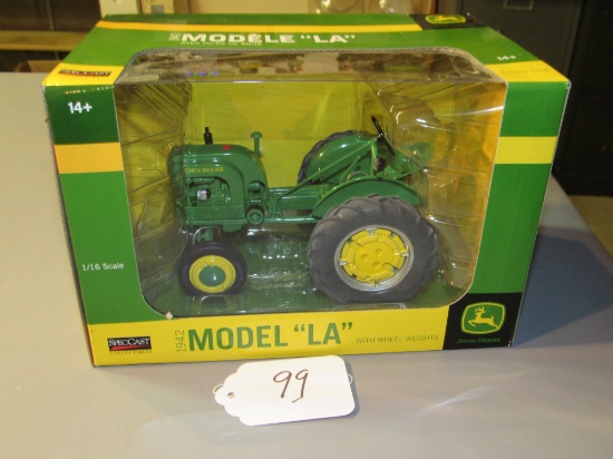 diecast JD "LA" tractor with wheel weights  W/box