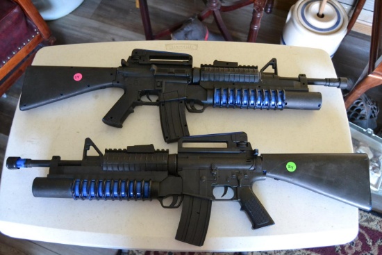 2 toy rifles (1 plastic 1 wood)