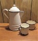 white & black enamel coffee pot, cup and pot