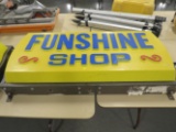 Funshine Shop hanging sign