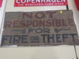 Not responsible for fire or theft metal sign