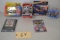 6 NASCAR collectibles (2 playing card tins, 1 plaque, 3 cars)