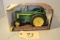 Ertl diecast JD model 820 diesel tractor W/ box