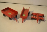 3 metal implements ( disk, spreader, wagon)