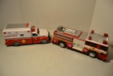 2 plastic emergency response vehicles ( fire truck, ambulance)
