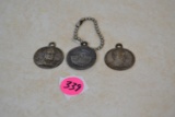 3 JD key chain medallions