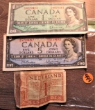 2 Canadian, 1 Nederland Currency