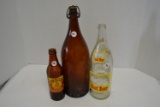 3 vintage beverage bottles