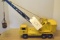 yellow metal Nylint crane digger