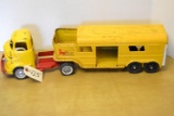 yellow metal livestock trailer & yellow Structo semi truck cab