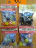 4 Bags of Marbles