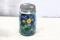 Blue jar of marbles