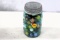 Blue jar of marbles