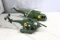 2 toy helicopters