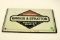 Metal Briggs & Straton sign