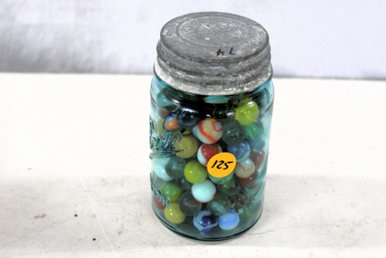 Blue jar of marbles