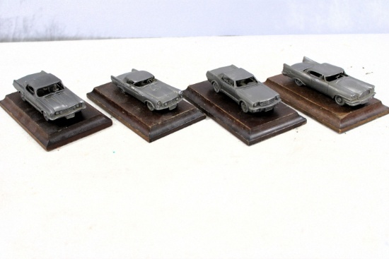 4 pewter cars W/ base - Avon