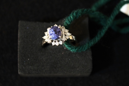 Platinum sapphire plus lots of diamonds ring