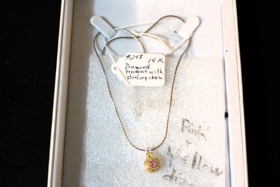 14K diamond pendant W/ sterling chain