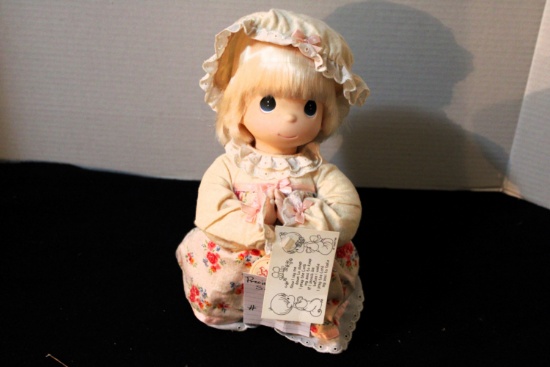 Precios Moments doll