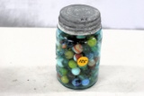 Blue jar of marbles