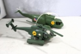 2 toy helicopters
