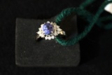 Platinum sapphire plus lots of diamonds ring
