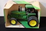 Diecast JD MFWD tractor with duals