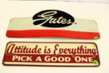 2 metal advertising signs