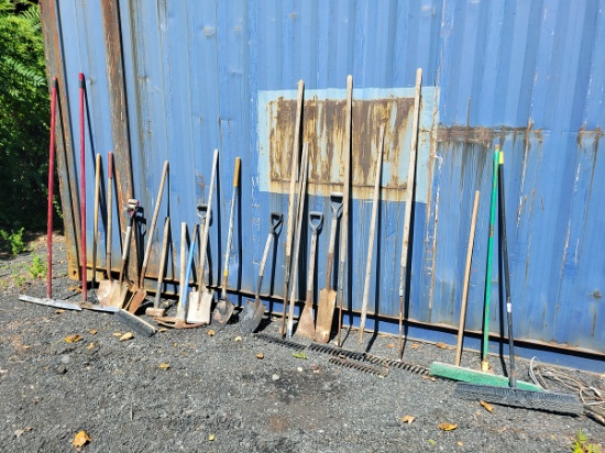 Group of (22) Assorted Rakes, Shovels, Brooms, and Pick Axes