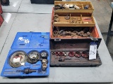 A group of assorted hole saw bits