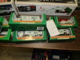 11 miniature Hess Trucks