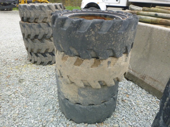 (4) 33x12-20 Solid Tires w/rims (QEA 6114)