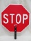 HANDHELD STOP/ SLOW SIGN