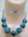 BLUE BEADS WITH ROSES