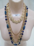 LOT OF 4 GOLD TONE AND NAVY FASHION NECKLACES